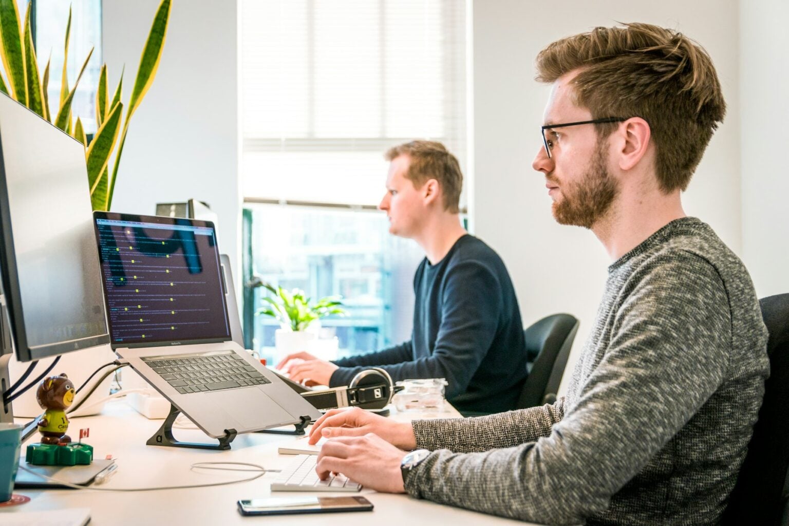 Small business owner working at a desktop computer