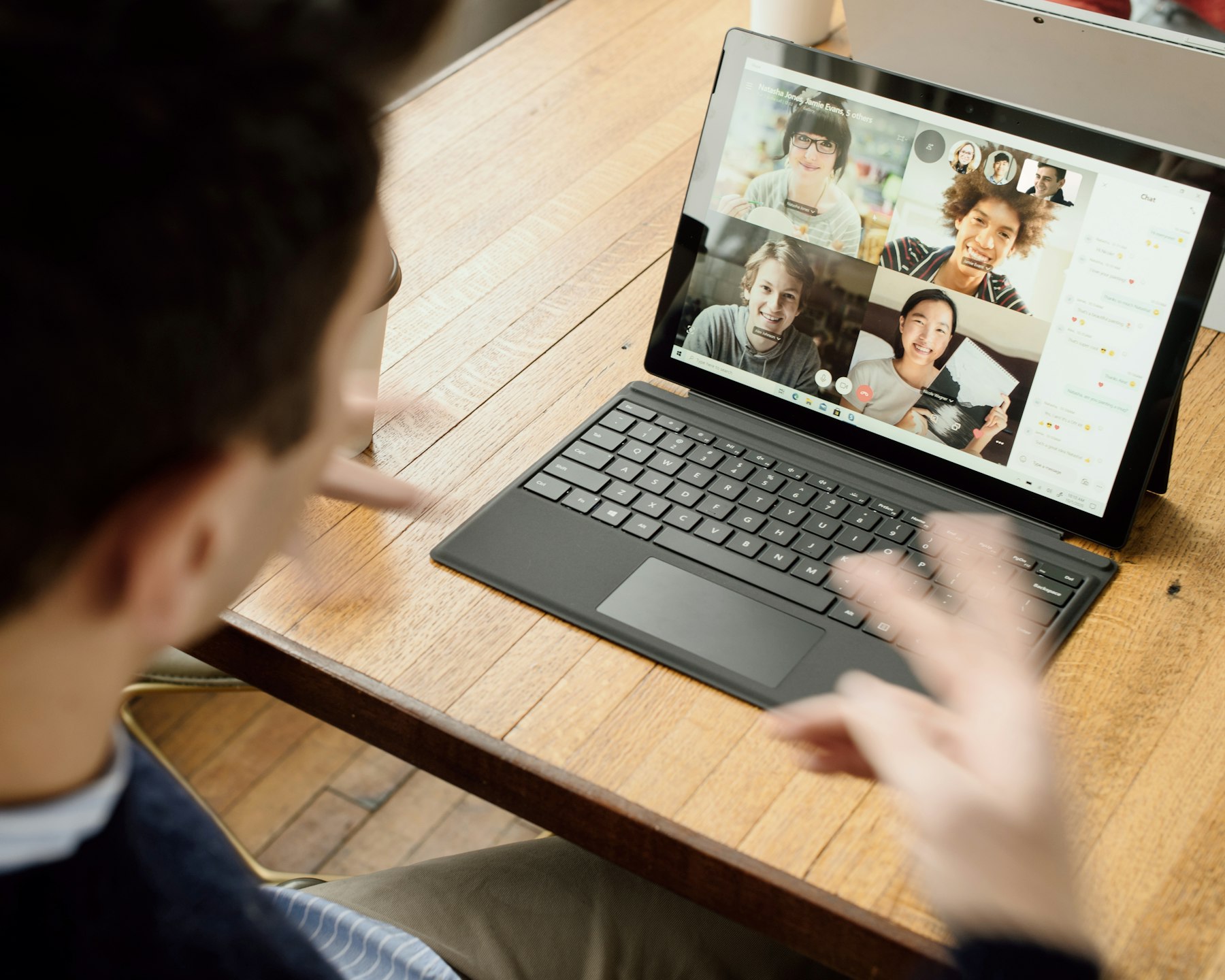 Video call on a tablet at a desk